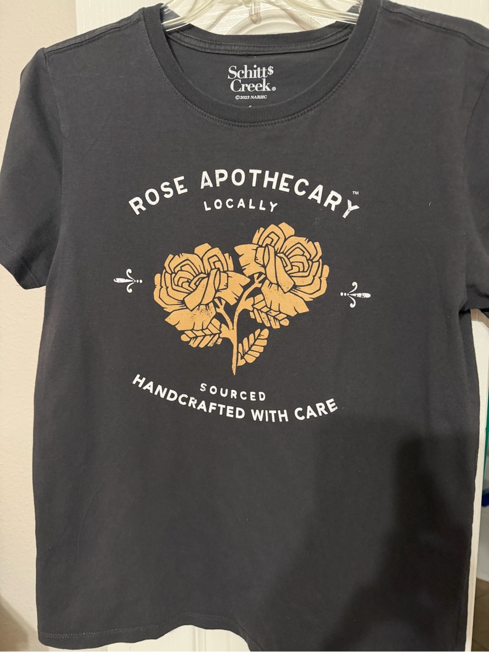 Target Schitt's Creek Rose Apothecary Graphic Tee - Black Floral; size small